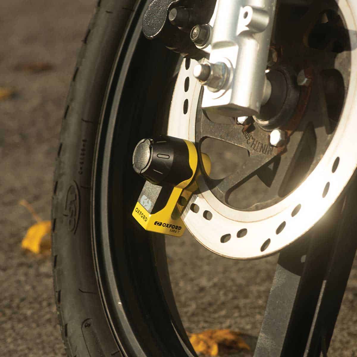 Secure Your Scooter Anywhere & Everywhere: Oxford's Mini T is your super-portable brake disc lock - in action